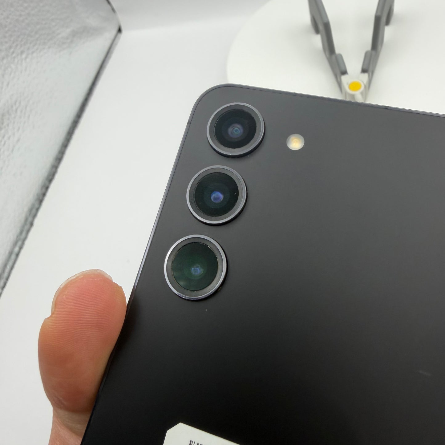 Samsung Galaxy S23 Phantom Black triple rear camera close-up
