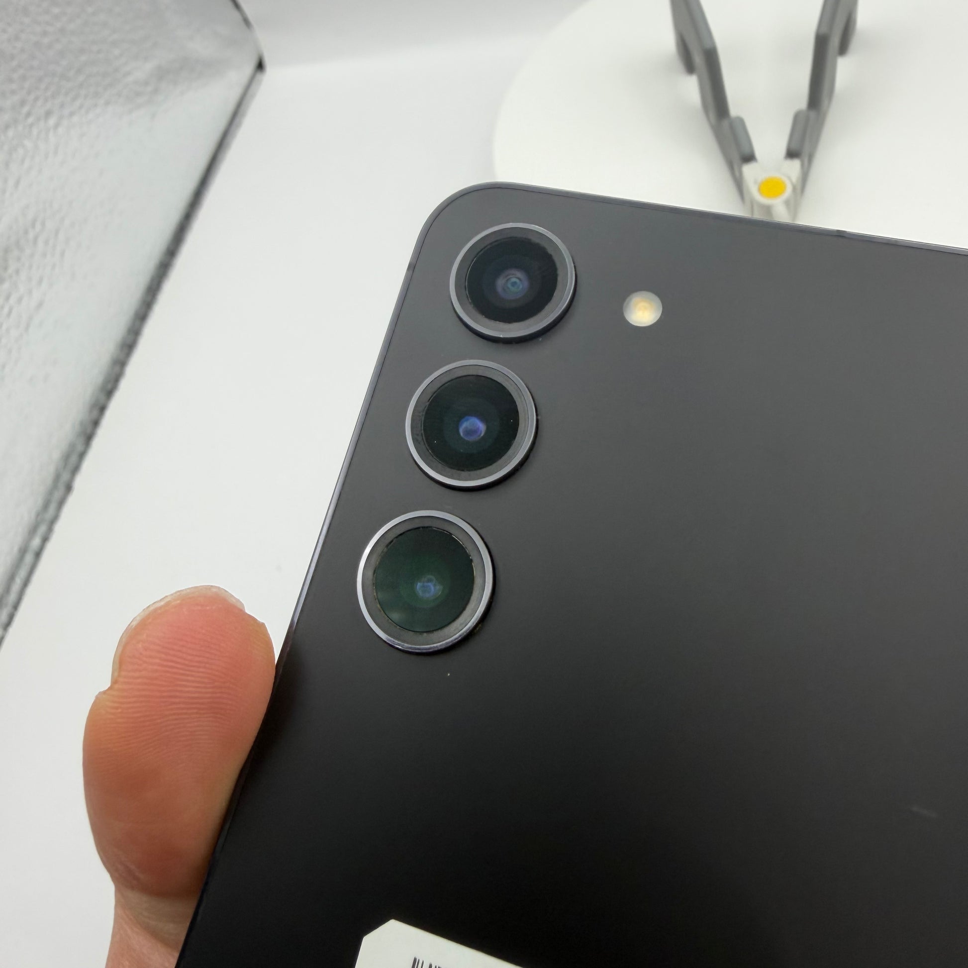 Samsung Galaxy S23 Phantom Black triple rear camera close-up